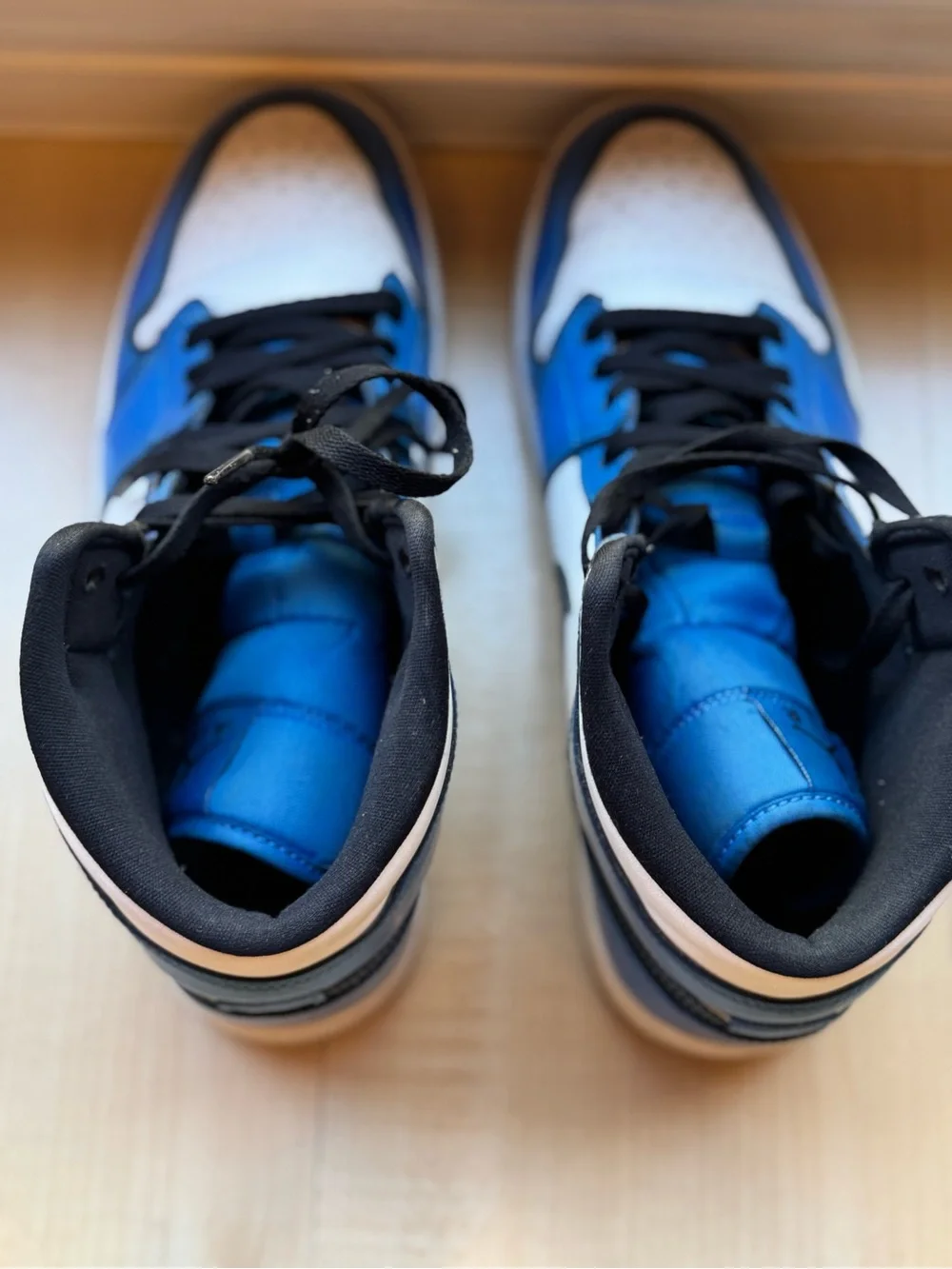 Jordan Men’s High-Top Sneakers in White, Blue and Black